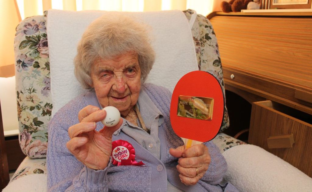Phyllis Lee, 105-years-old, is hailed as a Table Tennis Champion among her peers. She was flattered by the engraved bat she received as a birthday present. Phyllis Lee, 105-years-old, is hailed as a Table Tennis Champion among her peers. She was flattered by the engraved bat she received as a birthday present.